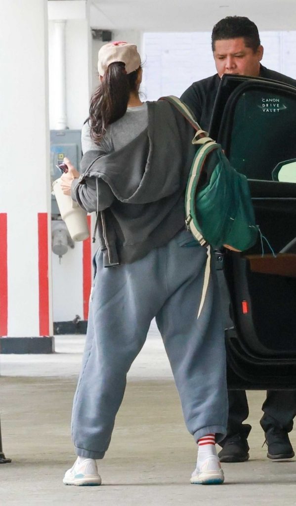 Sarah Silverman in a Grey Mickey Mouse Sweatshirt