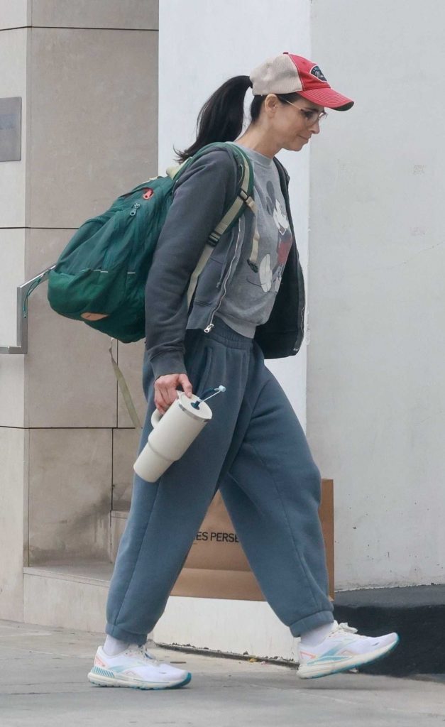 Sarah Silverman in a Grey Mickey Mouse Sweatshirt