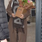 Tasha Ghouri is Given Good Luck Flowers as She Leaves Hotel in Blackpool