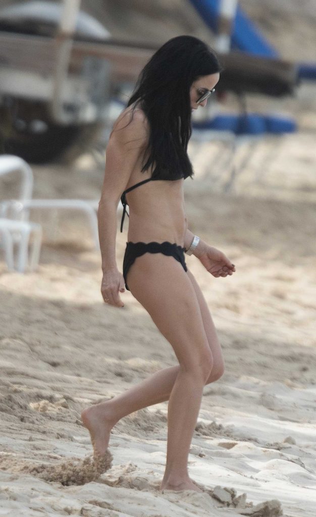 Andrea Corr in a Black Bikini