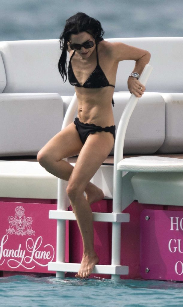 Andrea Corr in a Black Bikini