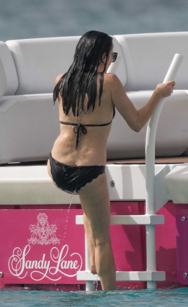 Andrea Corr in a Black Bikini