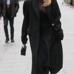 Ashley Roberts in a Black Coat Stepping Out from the Heart Radio in London