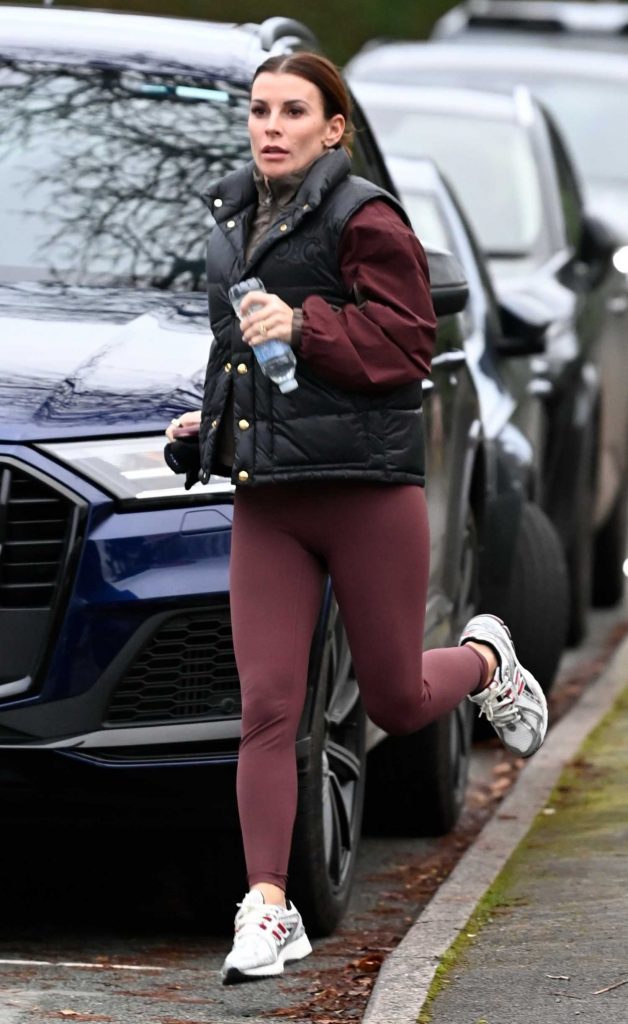 Coleen Rooney in a Black Vest