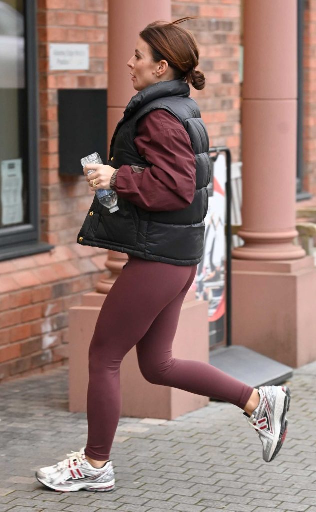 Coleen Rooney in a Black Vest