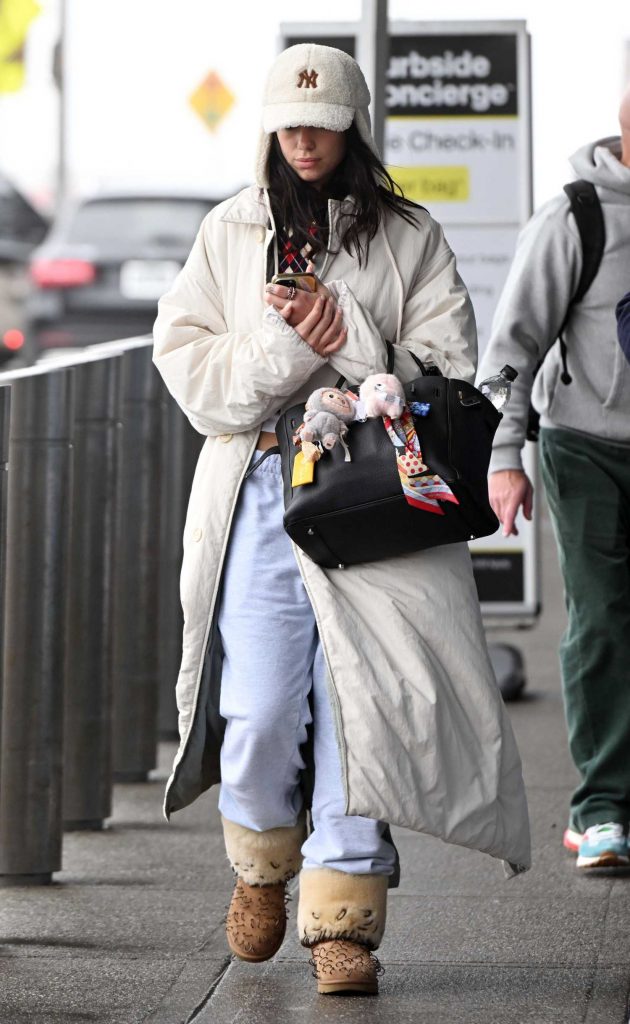 Dua Lipa in a White Coat