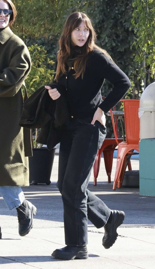 Elizabeth Olsen in a Black Jacket