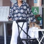 Khatira Rafiqzada in a White Sweatpants Wnjoying a Coffee Run with Michael Ealy at Maru Cafe on Christmas Eve in Los Feliz