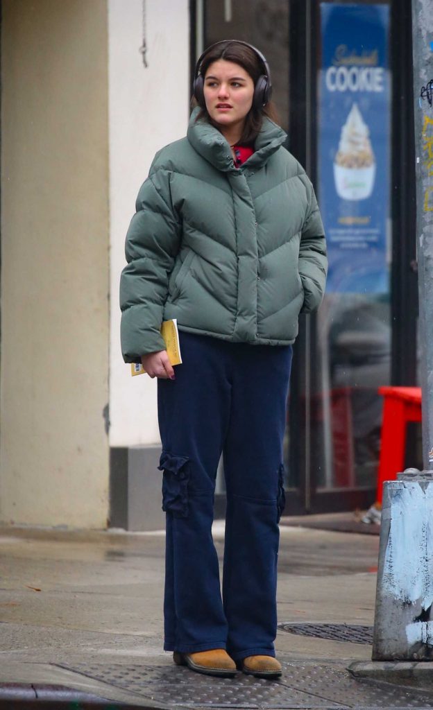 Suri Cruise in a Green Puffer Jacket