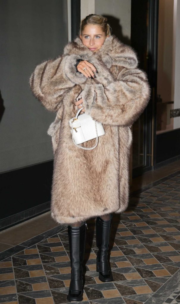 Caroline Daur in a Beige Fur Coat