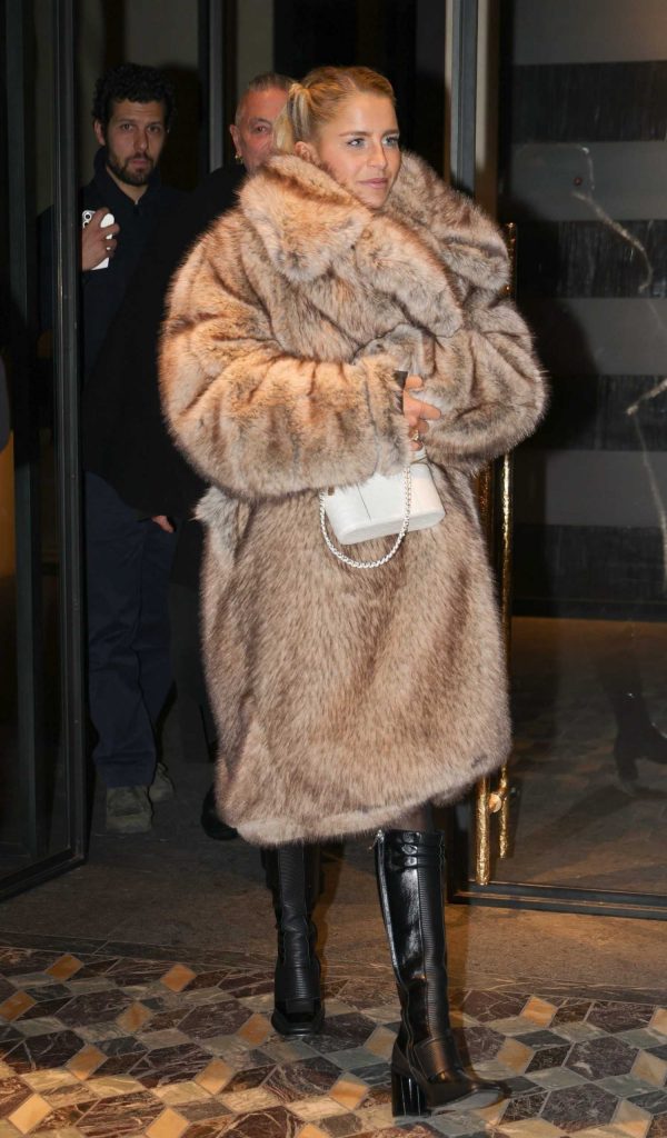 Caroline Daur in a Beige Fur Coat