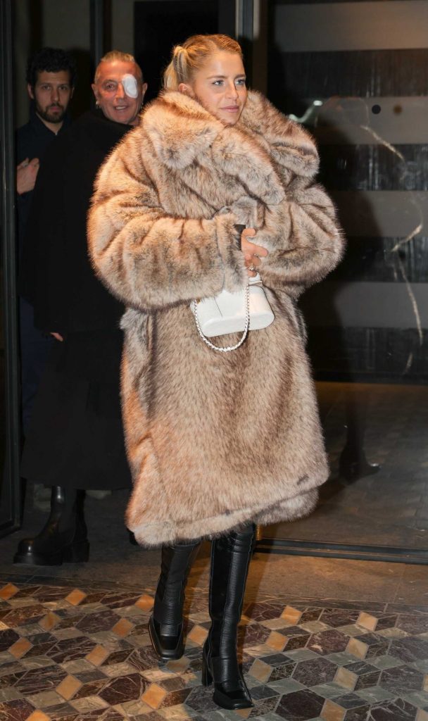 Caroline Daur in a Beige Fur Coat