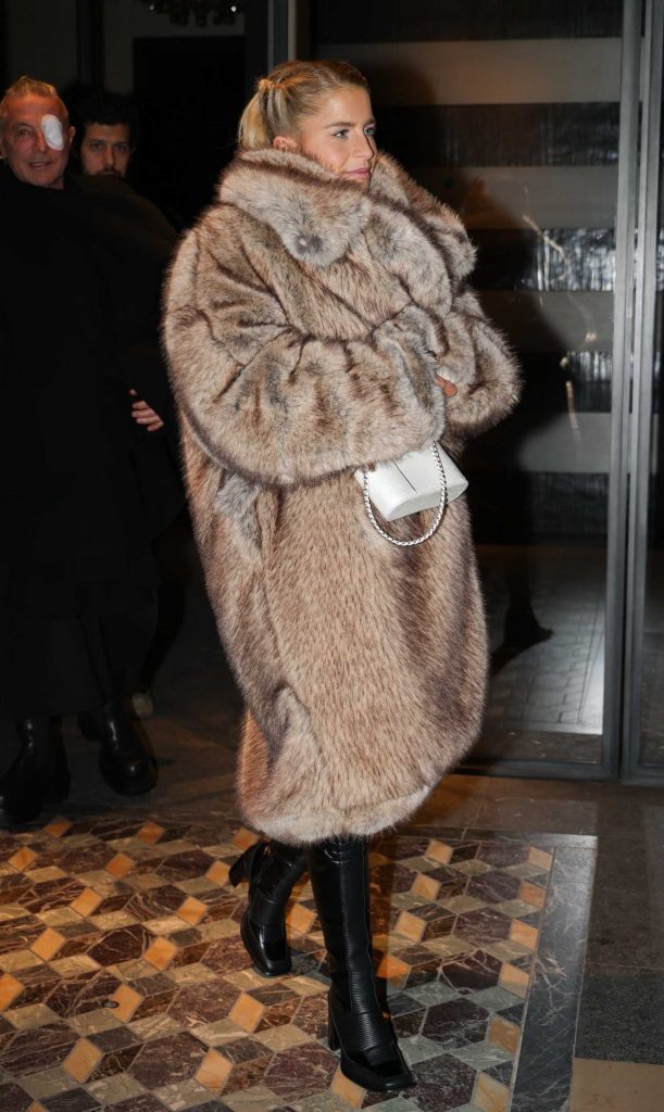 Caroline Daur in a Beige Fur Coat