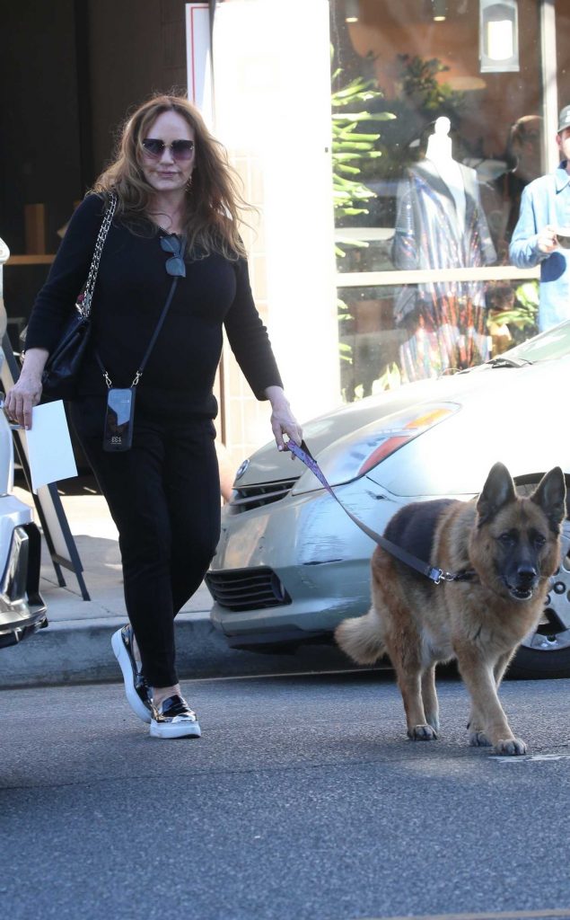 Catherine Bach in a Black Outfit