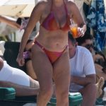 Claire Sweeney in an Orange Bikini on the Beach in Barbados