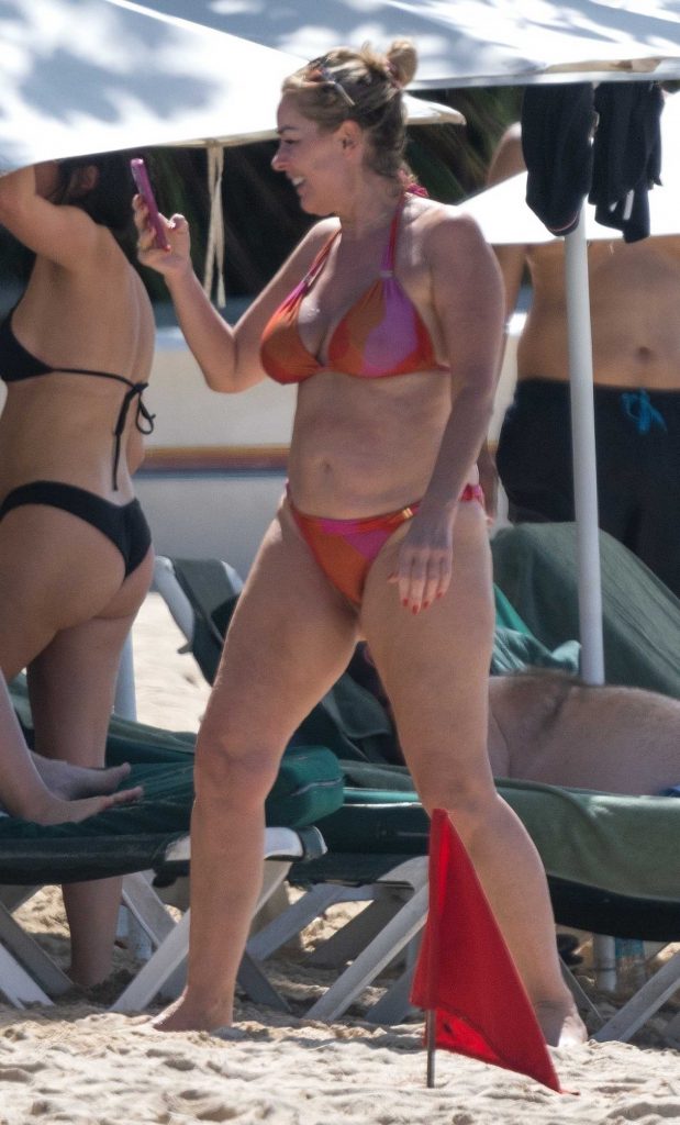 Claire Sweeney in an Orange Bikini