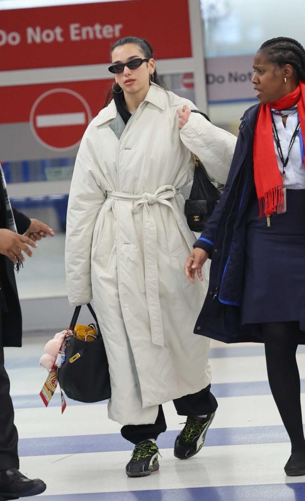 Dua Lipa in a Beige Puffer Coat