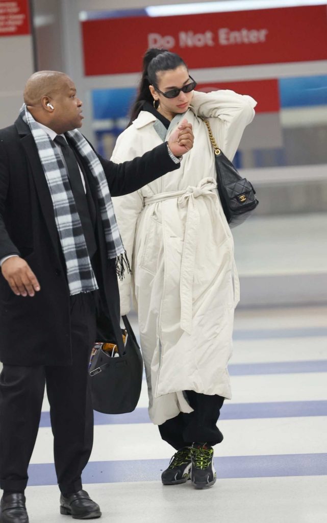 Dua Lipa in a Beige Puffer Coat