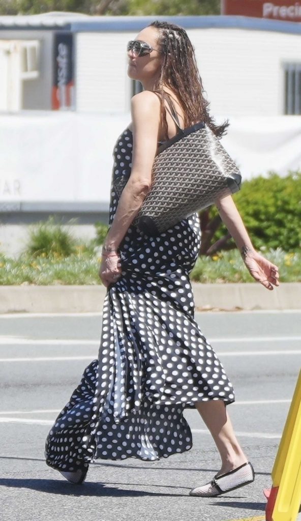 Lily Becker in a Black Polka Dot Dress