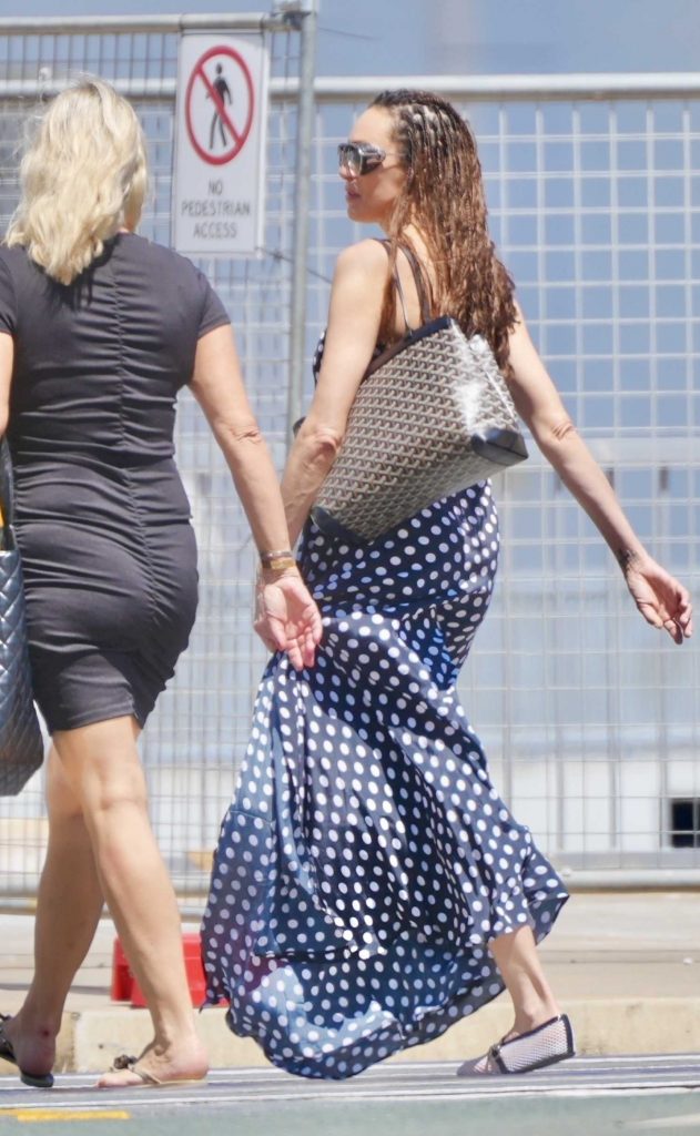 Lily Becker in a Black Polka Dot Dress