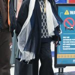 Madonna in a Black Jacket Arrives at JFK Airport with Her Boyfriend Akeem Morris in New York City