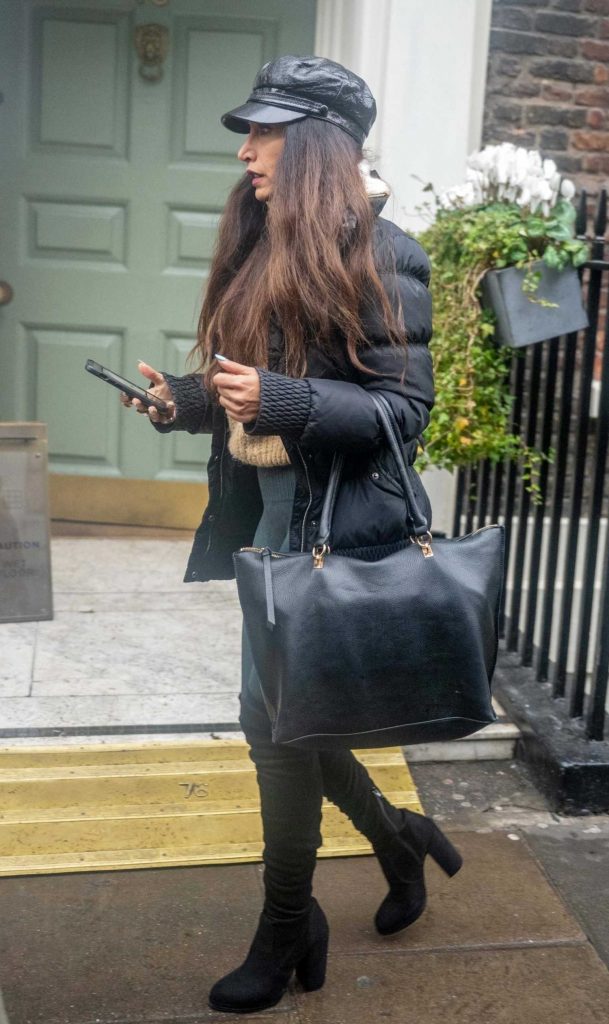 Preeya Kalidas in a Black Leather Cap