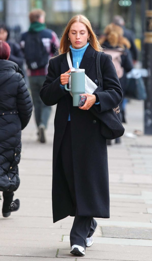 Sophie Sheridan in a Black Coat