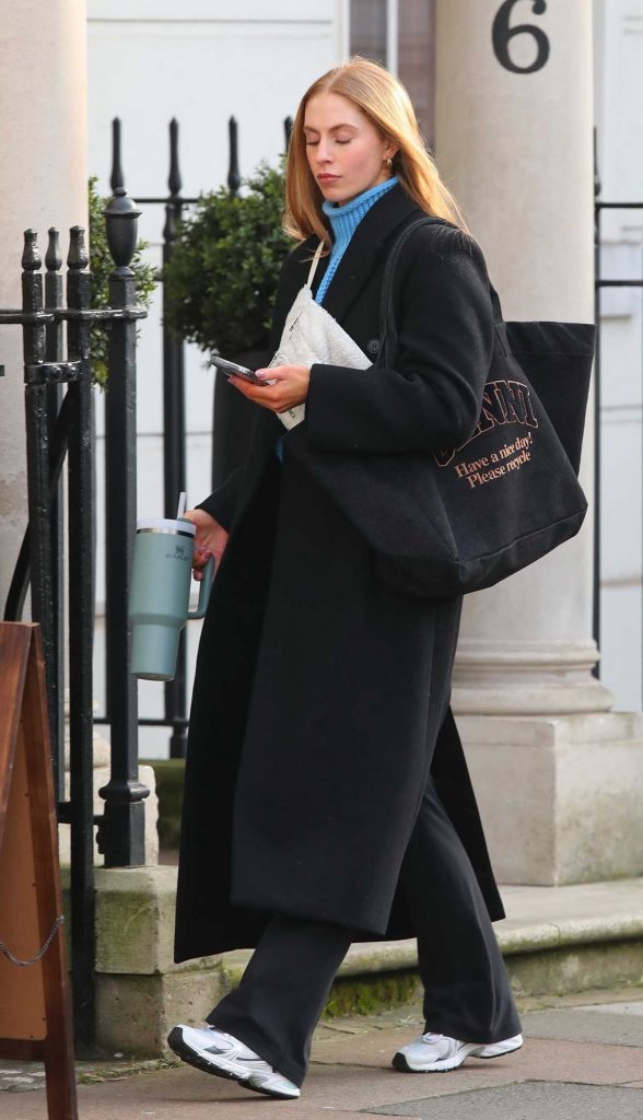 Sophie Sheridan in a Black Coat