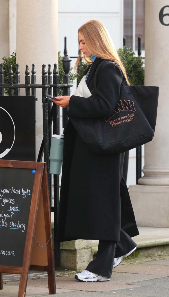 Sophie Sheridan in a Black Coat