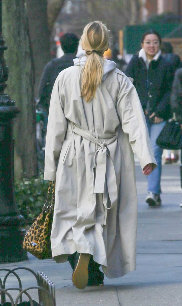 Jennifer Lawrence in a Beige Trench Coat