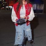 Jordyn Woods in a Black Cap Arrives at the Knicks Game in New York City