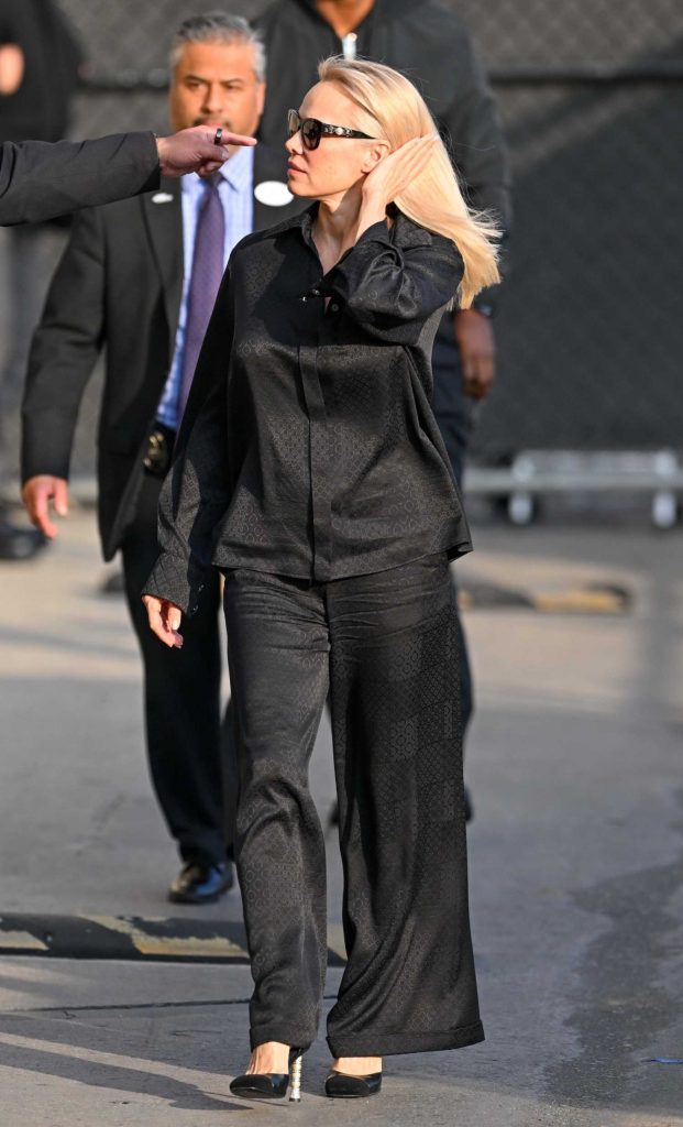 Pamela Anderson in a Black Pantsuit