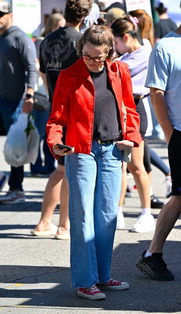 Zoey Deutch in a Red Jacket