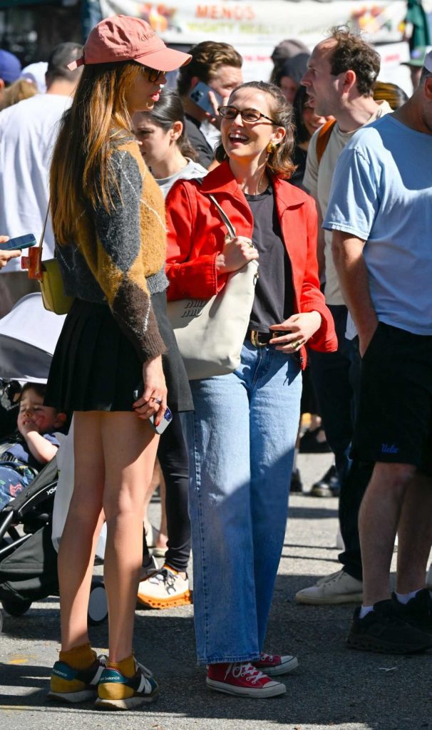 Zoey Deutch in a Red Jacket