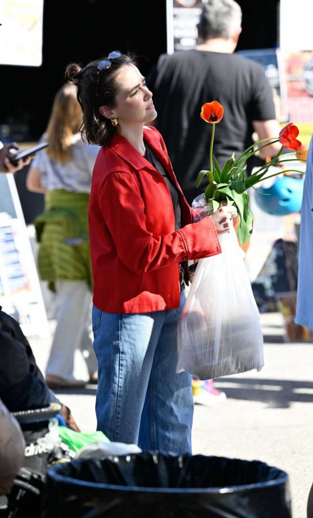 Zoey Deutch in a Red Jacket