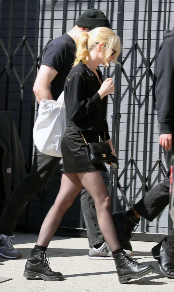 Kristen Stewart in a Black Mini Skirt