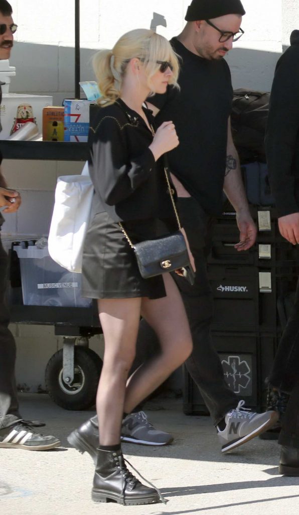 Kristen Stewart in a Black Mini Skirt