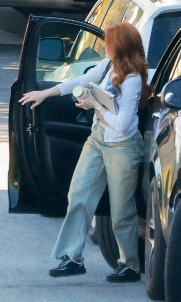 Madelaine Petsch in an Olive Pants