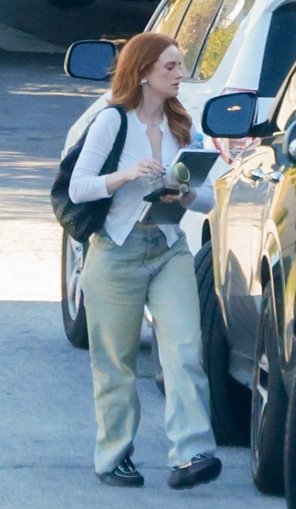 Madelaine Petsch in an Olive Pants