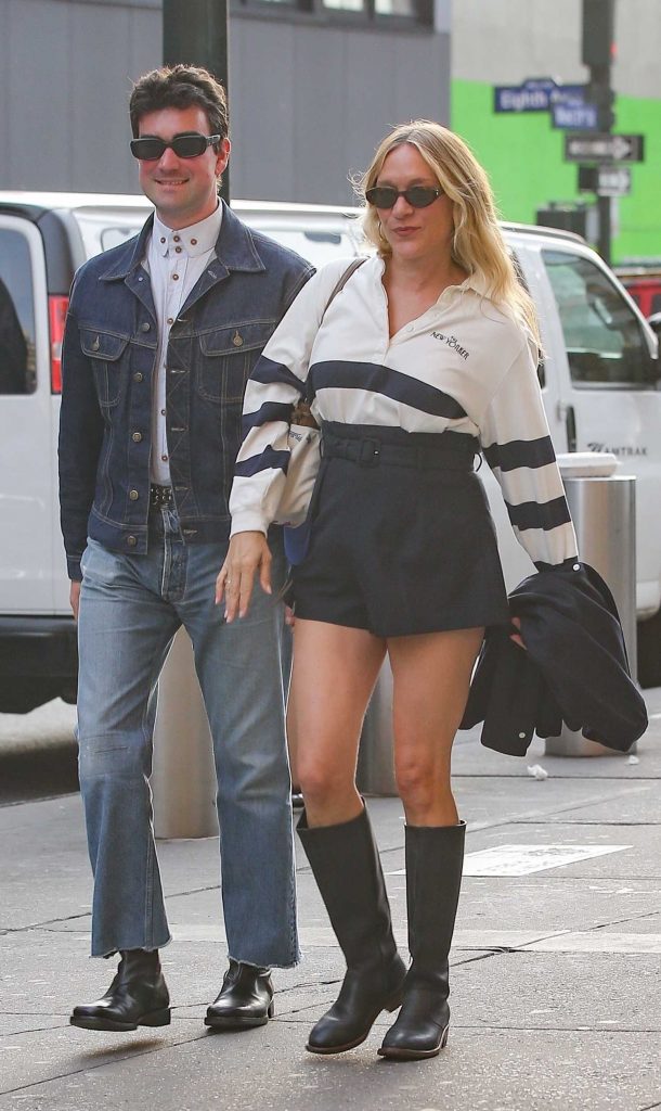 Chloe Sevigny in a Black Knee-Length Boots
