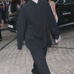 Elle Fanning in a Black Ensemble Leaves the Hotel Martinez in Cannes