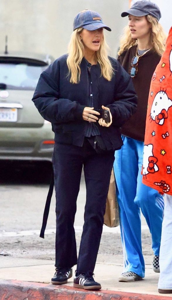 Ellie Goulding in a Black Sneakers