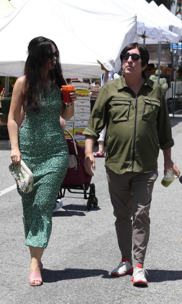 Natasha Blasick in a Green Floral Dress