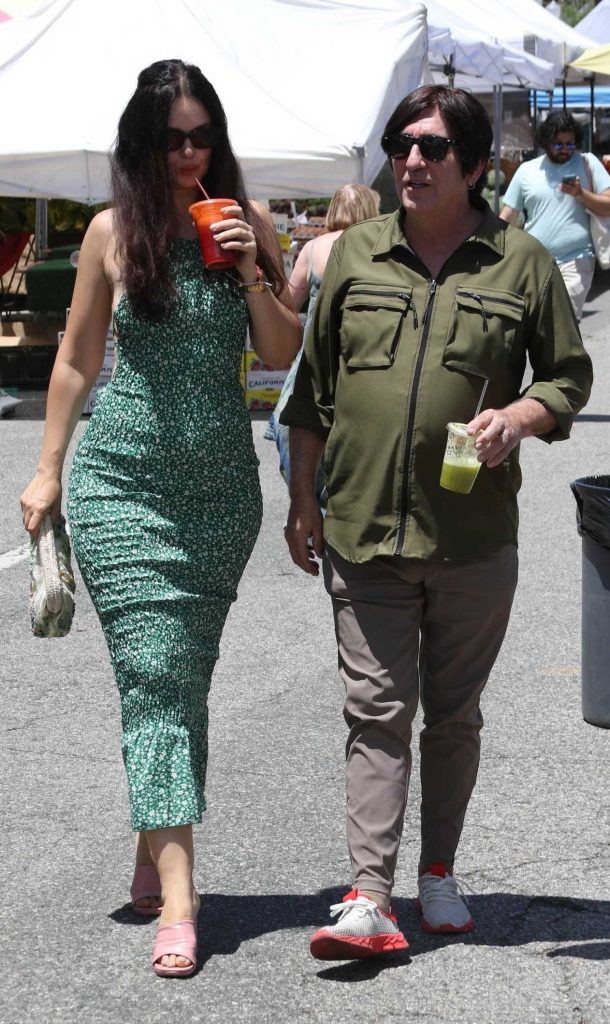 Natasha Blasick in a Green Floral Dress