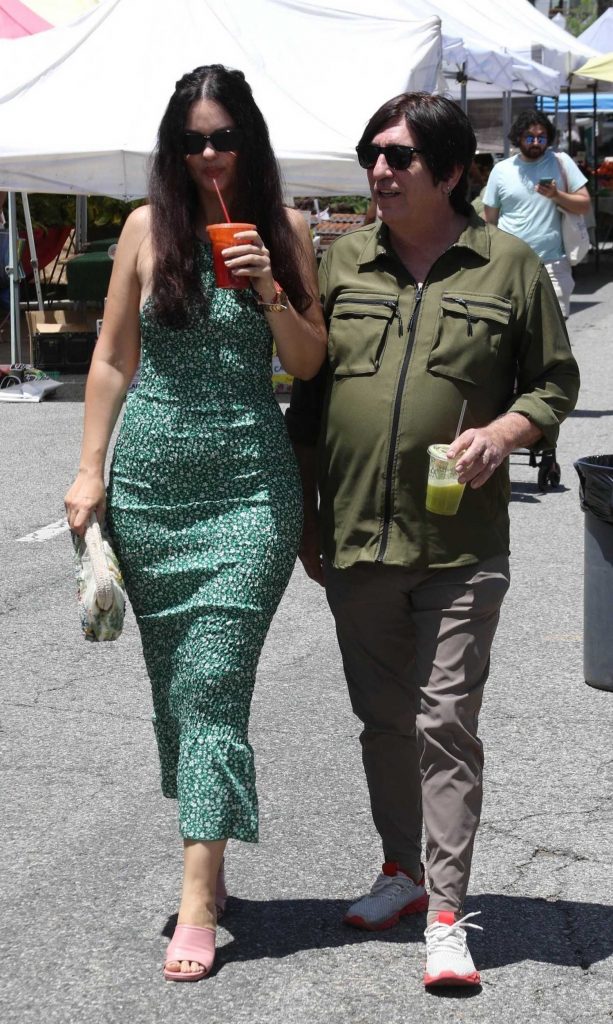 Natasha Blasick in a Green Floral Dress