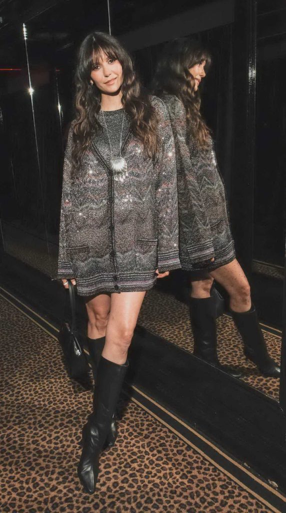Nina Dobrev in a Black Knee-Length Boots