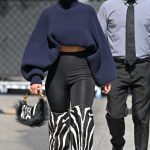 Adria Arjona in a Blue Sweater Arrives at Jimmy Kimmel Live in Hollywood