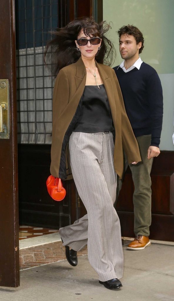 Dakota Johnson in a Tan Blazer