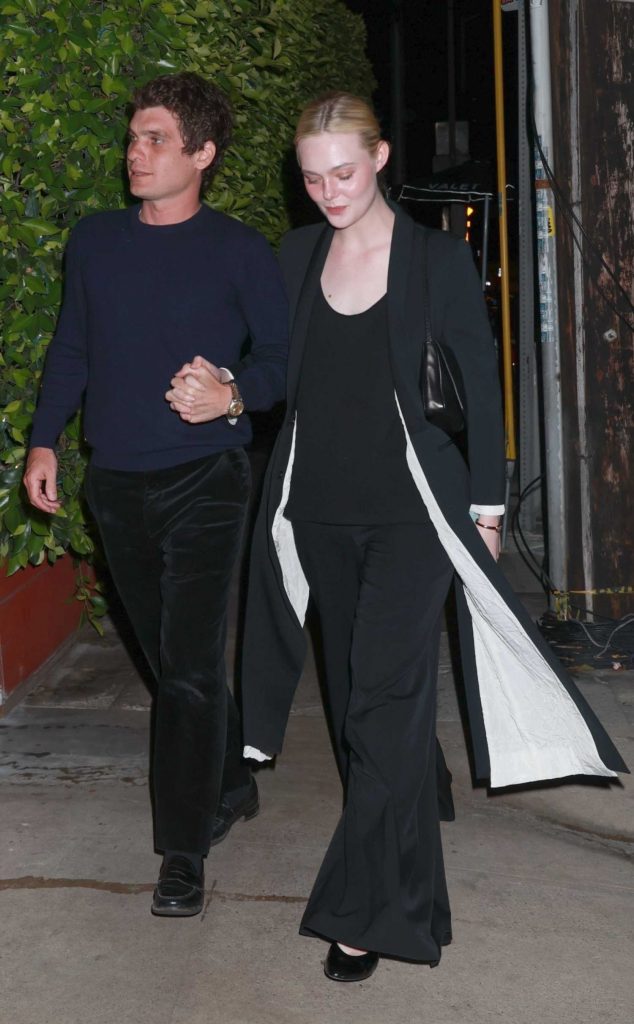Elle Fanning in a Black Coat