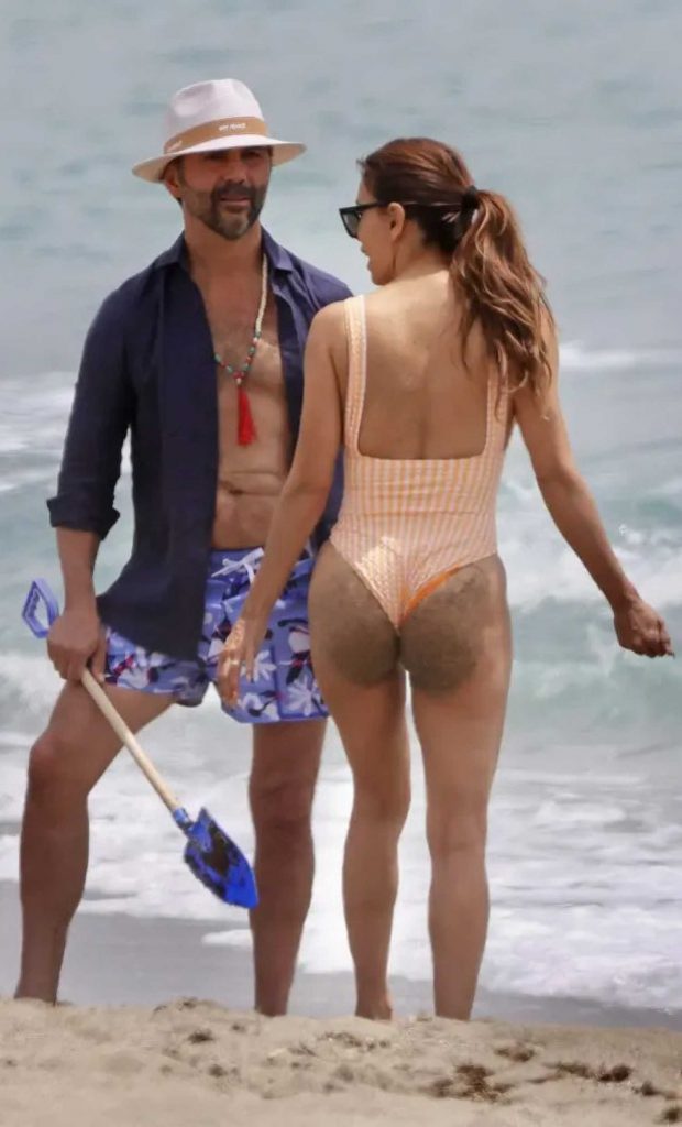 Eva Longoria in an Orange Swimsuit